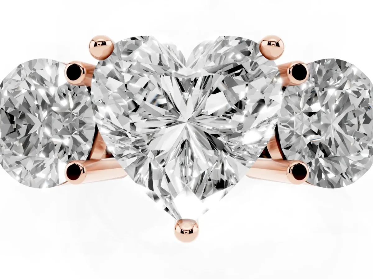 Three-Stone Heart Cut Brilliant Cut Solitaire Ring with Prong Setting on a Classic Band Rose gold