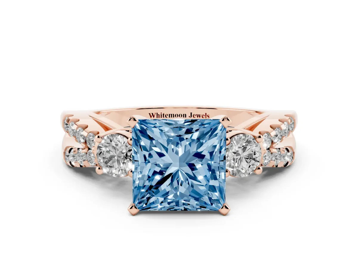 Fancy Blue Princess Cut Diamond Three-Stone Ring with Pavé Split Shank and Four-Prong Setting Rose gold