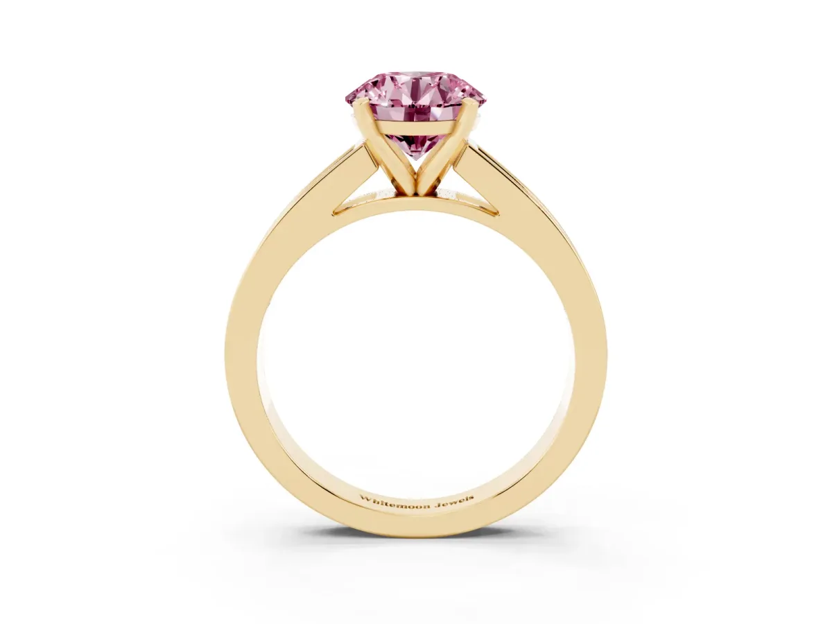 Fancy Pink Round Cut Solitaire Diamond Ring with Channel-Set Band and Four-Prong Setting Yellow gold