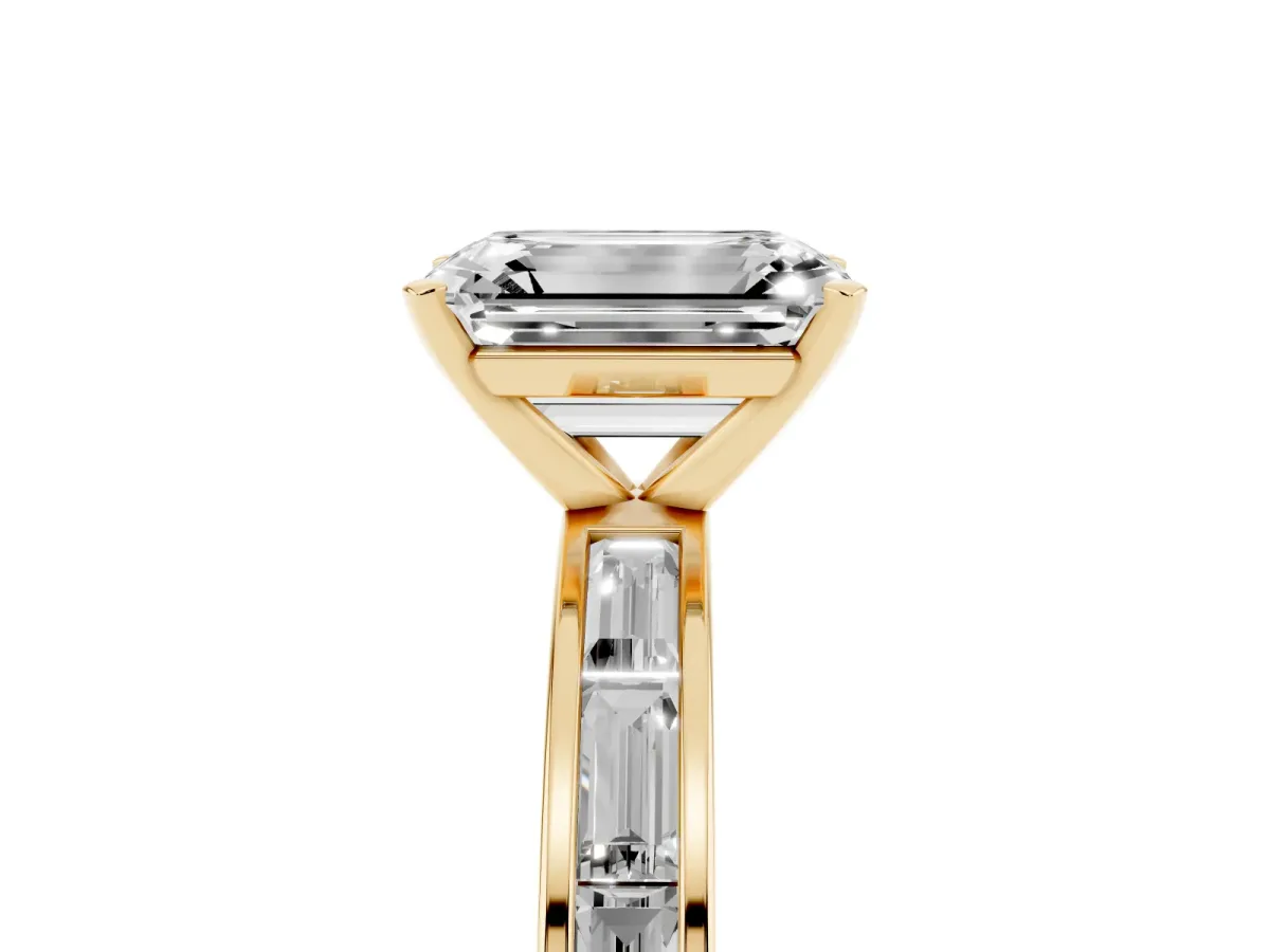 Emerald Cut Solitaire Diamond Ring with Channel-Set Baguette Band and Four-Prong Setting Yellow gold