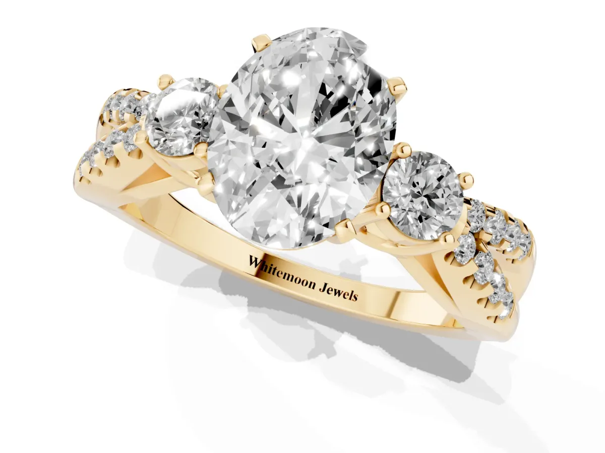 Oval Cut Diamond Three-Stone Ring with Pavé Split Shank and Four-Prong Setting Yellow gold