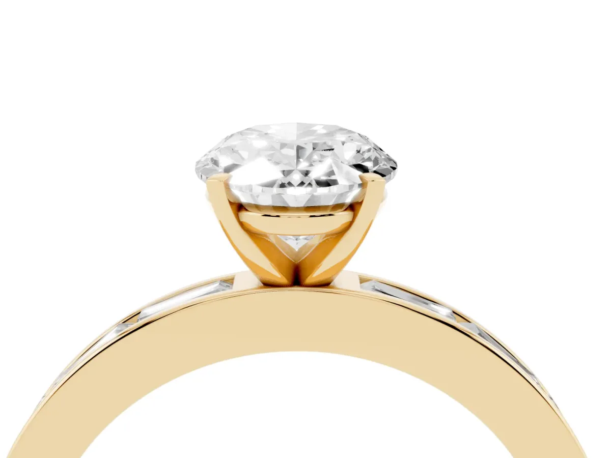 Oval Cut Solitaire Diamond Ring with Channel-Set Baguette Band and Four-Prong Setting Yellow gold
