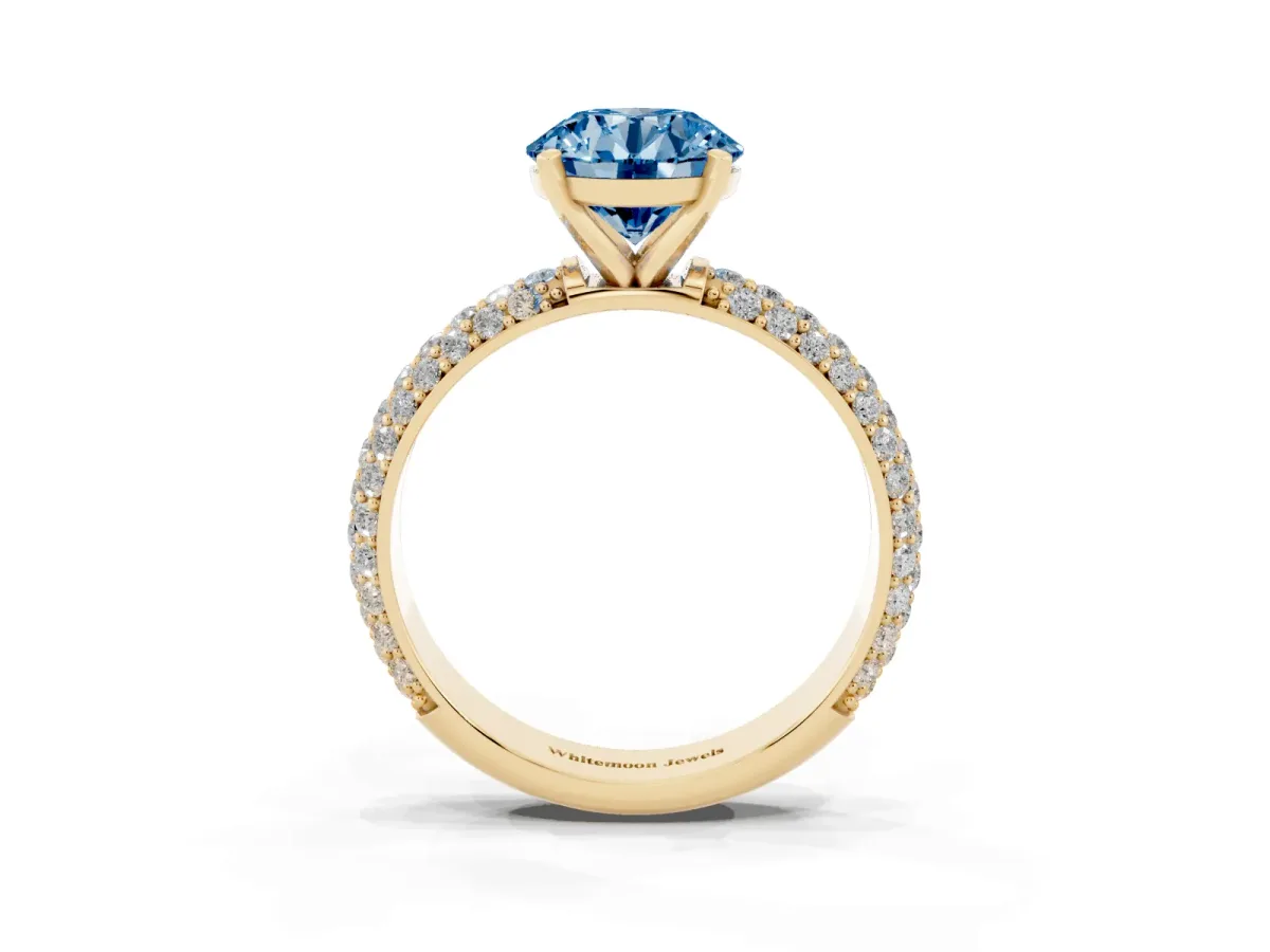 Fancy Blue Round Cut Diamond Solitaire Ring with Prong Setting and Pavé Band Yellow gold