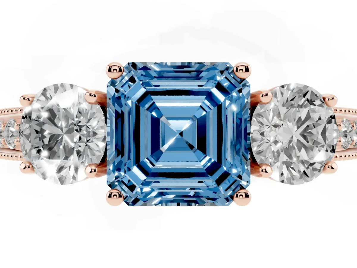 Fancy Blue Asscher Cut Three-Stone Diamond Ring with Pavé Band and Four-Prong Setting Rose gold
