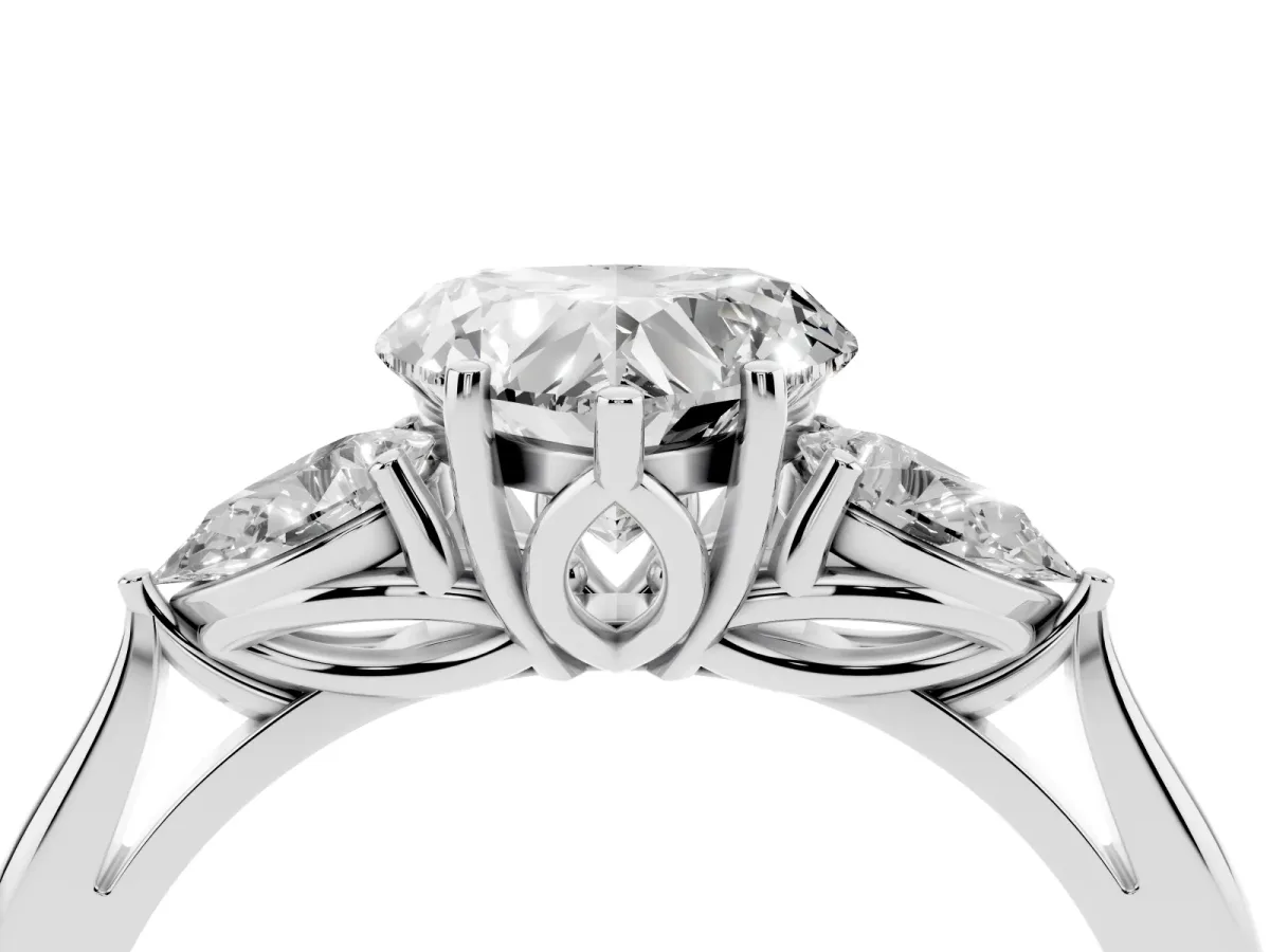 Heart Cut Diamond Three-Stone Ring with Pear Side Stones and Prong Setting Platinum