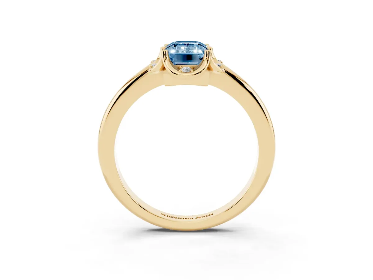 Fancy Blue Emerald Cut Halo Diamond Ring with Round Cluster Setting, Solitaire Band, and Four-Prong Setting Yellow gold