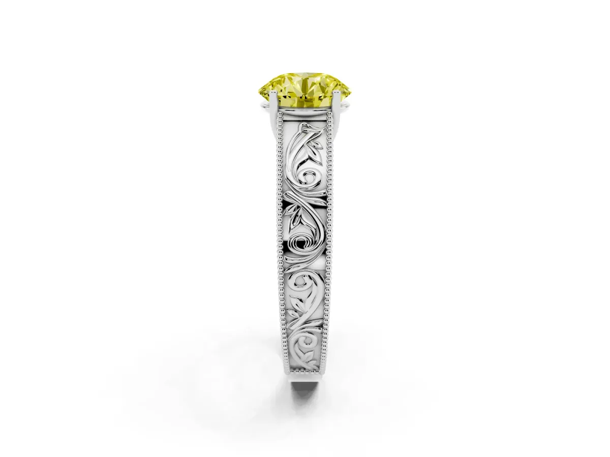 Fancy Yellow Round Cut Diamond Solitaire Ring with Engraved Band and Four-Prong Setting White gold