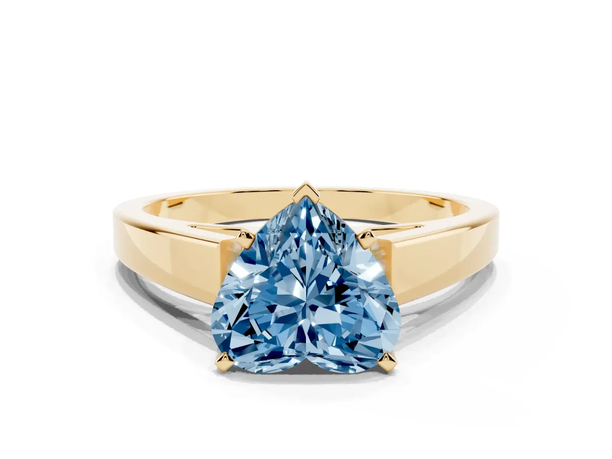 Fancy Blue Heart Cut Solitaire Engagement Ring with Four-Prong Setting and Tapered Band Yellow gold