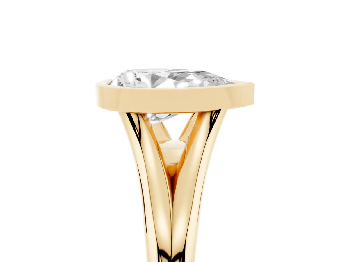 Bezel Set Pear Cut Cut Solitaire Ring with Tapered Band Yellow gold
