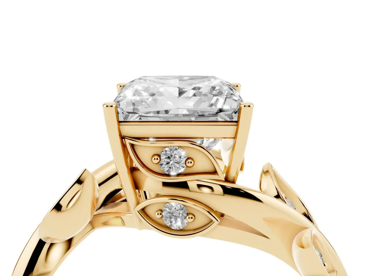 Princess Cut Solitaire Twist Engagement Ring with Leaf Accents and Prong Setting Yellow gold