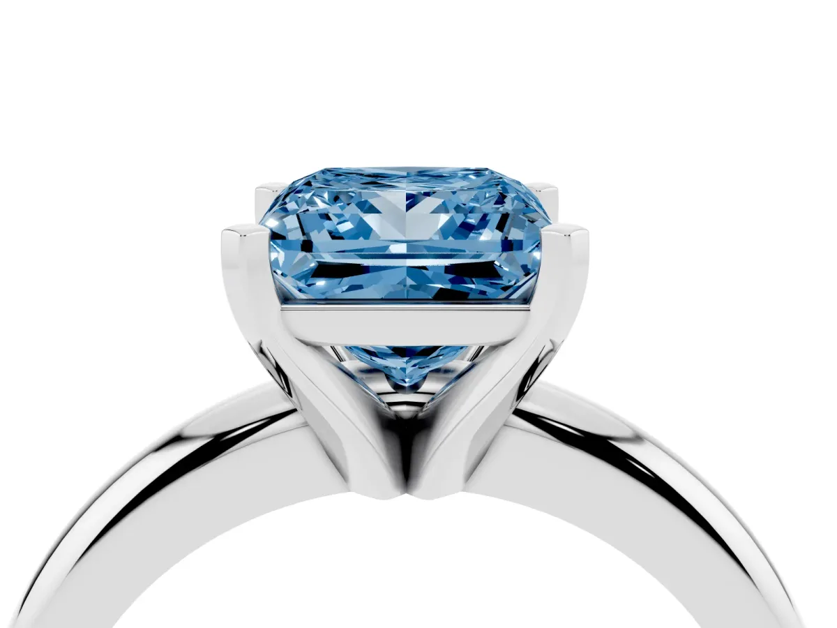 Fancy Blue Princess Cut Diamond Solitaire Engagement Ring with Round Band and Four-Prong Setting Silver