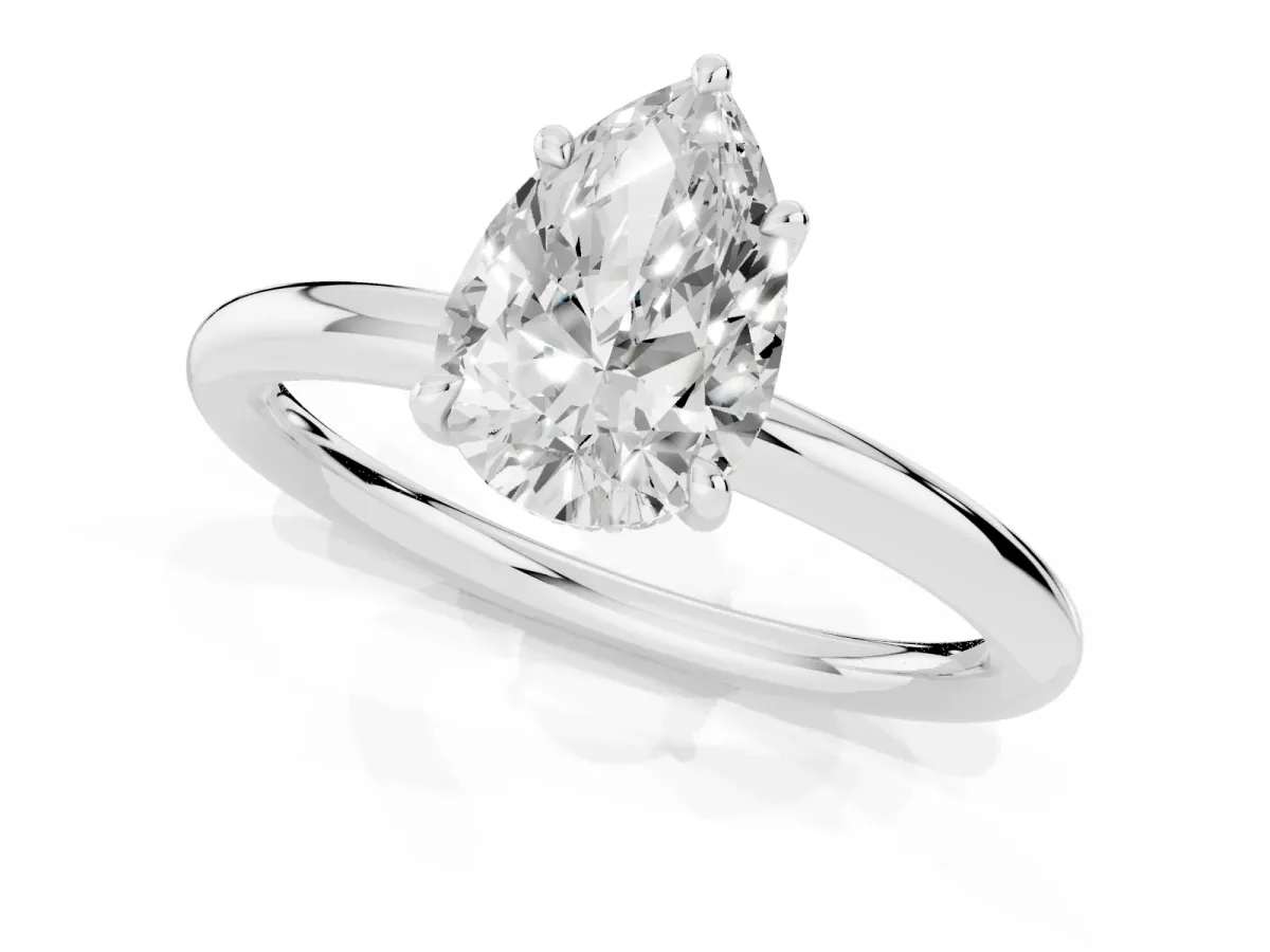 Pear Cut Diamond Solitaire Ring with Thin Band and Four-Prong Setting Silver