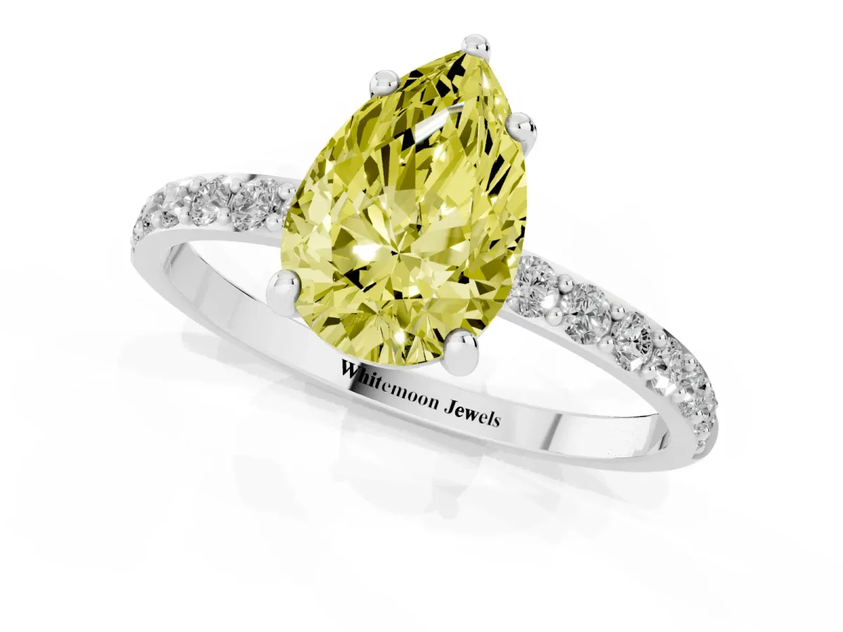 Fancy Yellow Pear Cut Diamond Solitaire Ring with Round Pavé Band and Prong Setting Silver