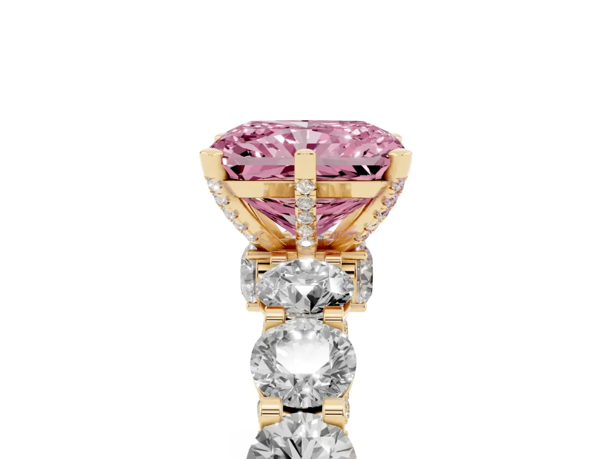 Fancy Pink Radiant Cut Diamond Side Stone Engagement Ring with Four-Prong Setting Yellow gold