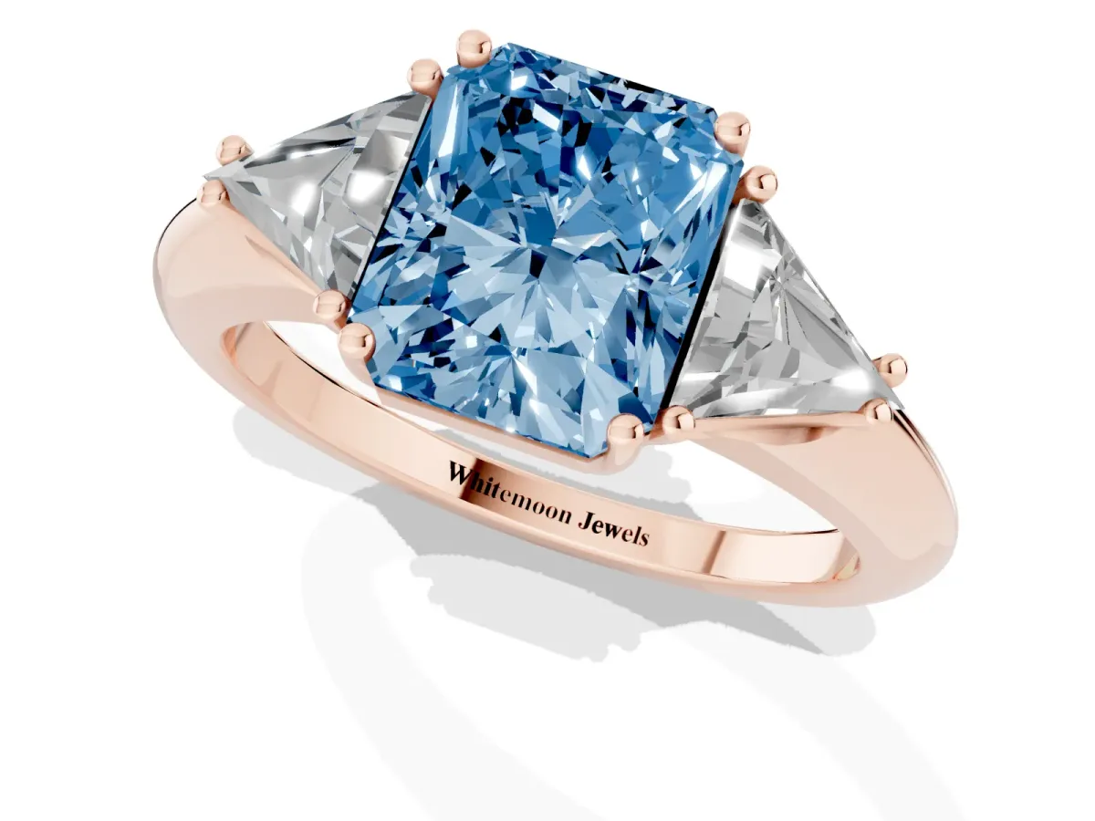 Fancy Blue Three-Stone Radiant Cut Diamond Engagement Ring with Trillion Side Stones and Prong Setting Rose gold