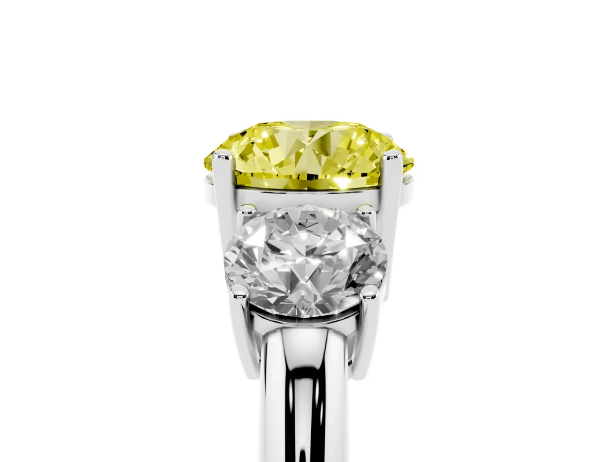 Fancy Yellow Three-Stone Round Cut Cut Diamond Engagement Ring with Prong Setting on a White Gold Band Silver