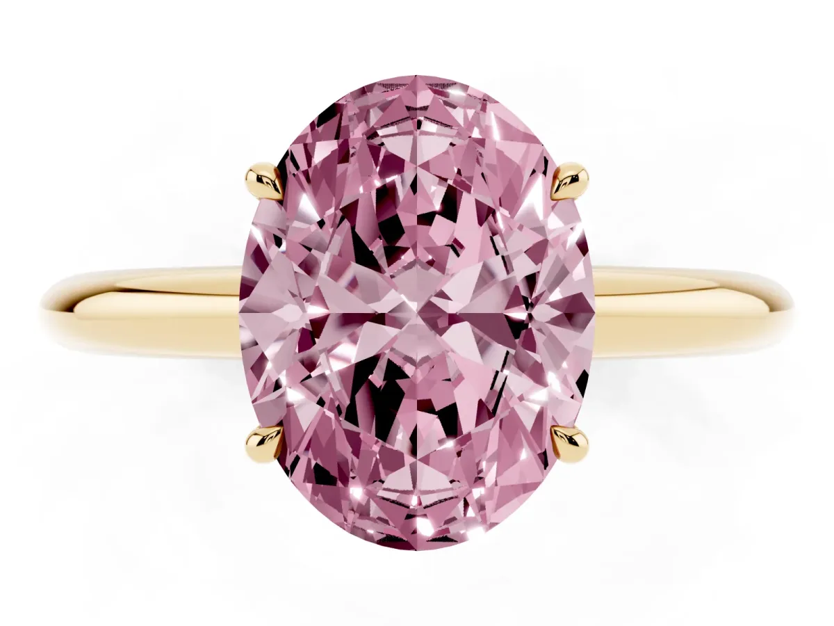 Fancy Pink Oval Cut Brilliant Solitaire Engagement Ring with Six-Prong Setting and Classic Band Yellow gold