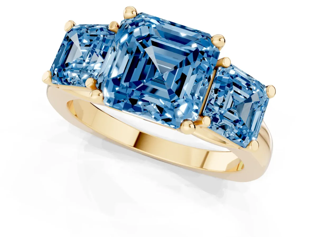 Fancy Blue Three-Stone Asscher Cut Brilliant Diamond Trellis Ring with Comfort Fit Band Yellow gold