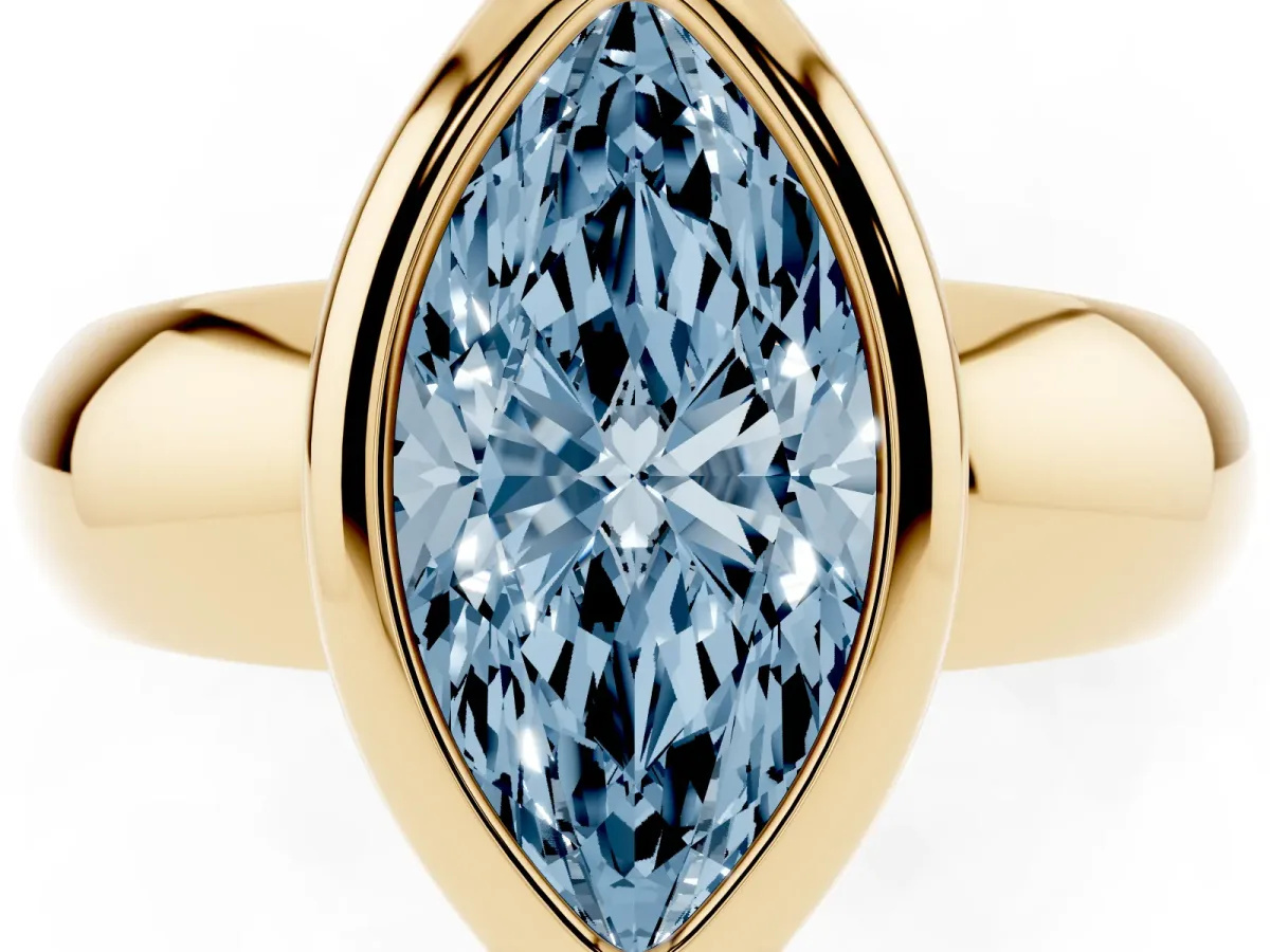 Fancy Blue Bezel Set Marquise Cut Solitaire Ring with Wide Band Yellow gold
