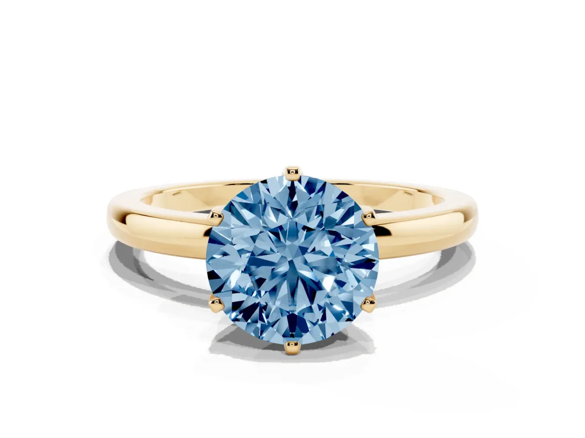 Fancy Blue Round Cut Solitaire Diamond Ring with Six-Prong Setting on a Classic Band Yellow gold