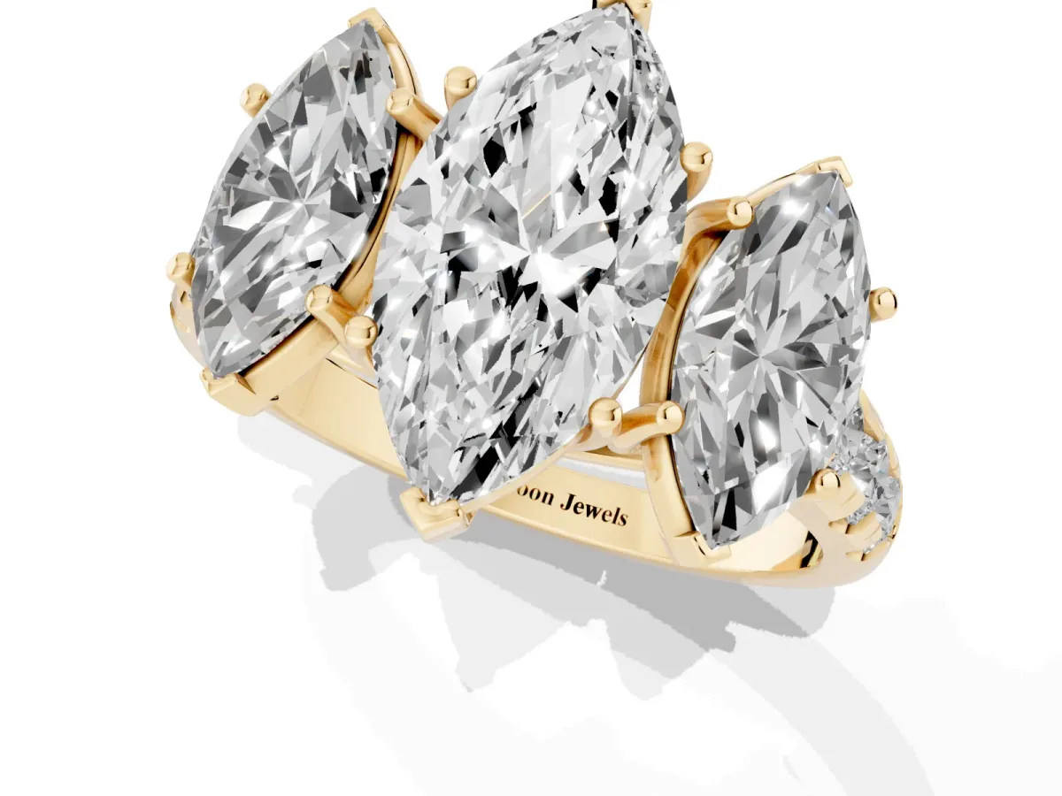 Three-Stone Marquise Cut Diamond Pavé Band with Prong Setting Yellow gold