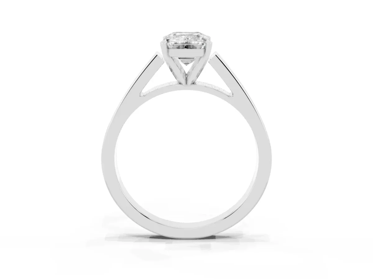 Emerald Cut Solitaire Engagement Ring with Four-Prong Setting and Tapered Band Silver