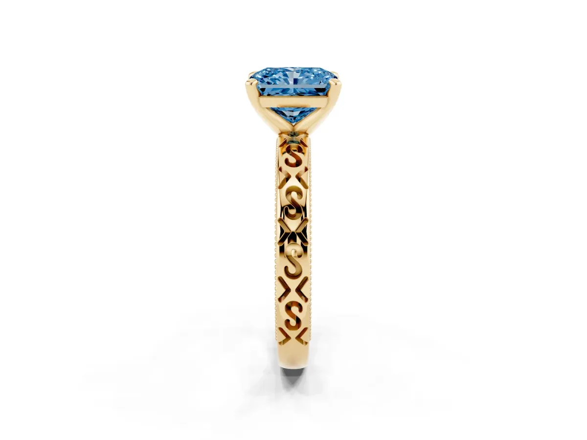 Fancy Blue Radiant Cut Solitaire Engagement Ring with Scrollwork Band and Four-Prong Setting Yellow gold