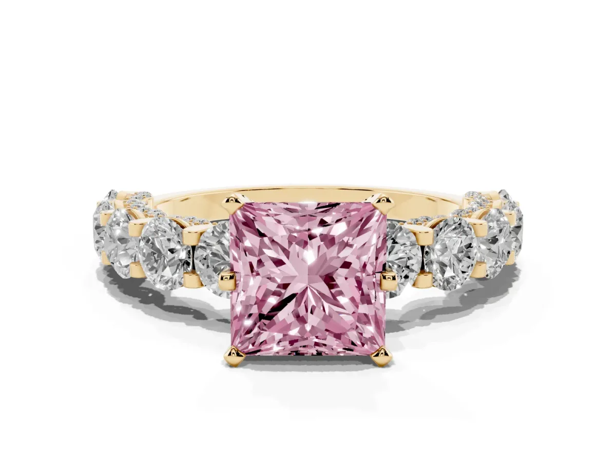 Fancy Pink Princess Cut Diamond Side Stone Engagement Ring with Four-Prong Setting Yellow gold