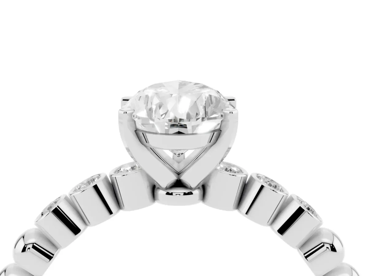 Pear Cut Solitaire Bezel Accent Diamond Engagement Ring with Beaded Band and Four-Prong Setting Platinum