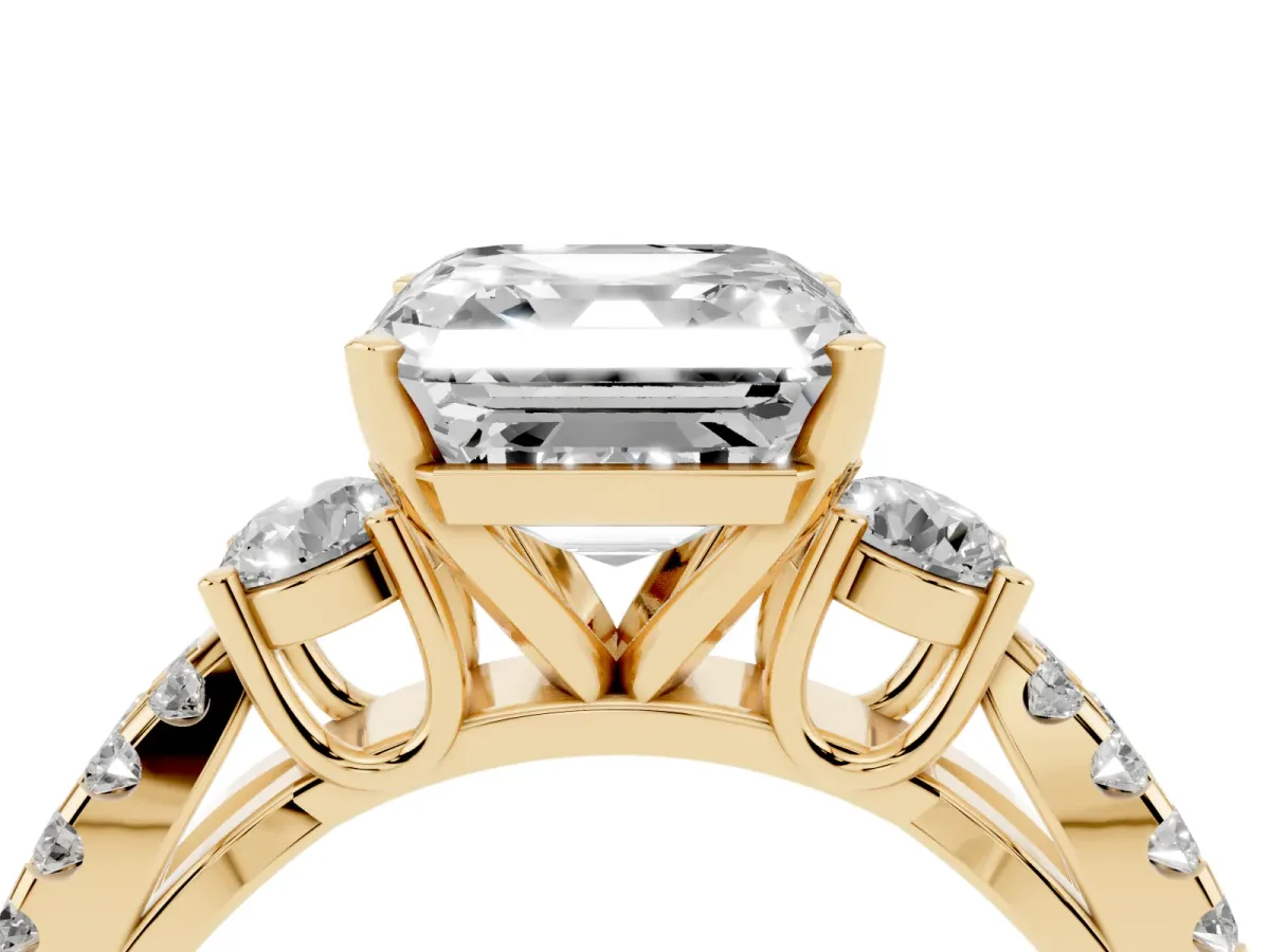 Asscher Cut Diamond Three-Stone Ring with Pavé Split Shank and Four-Prong Setting Yellow gold