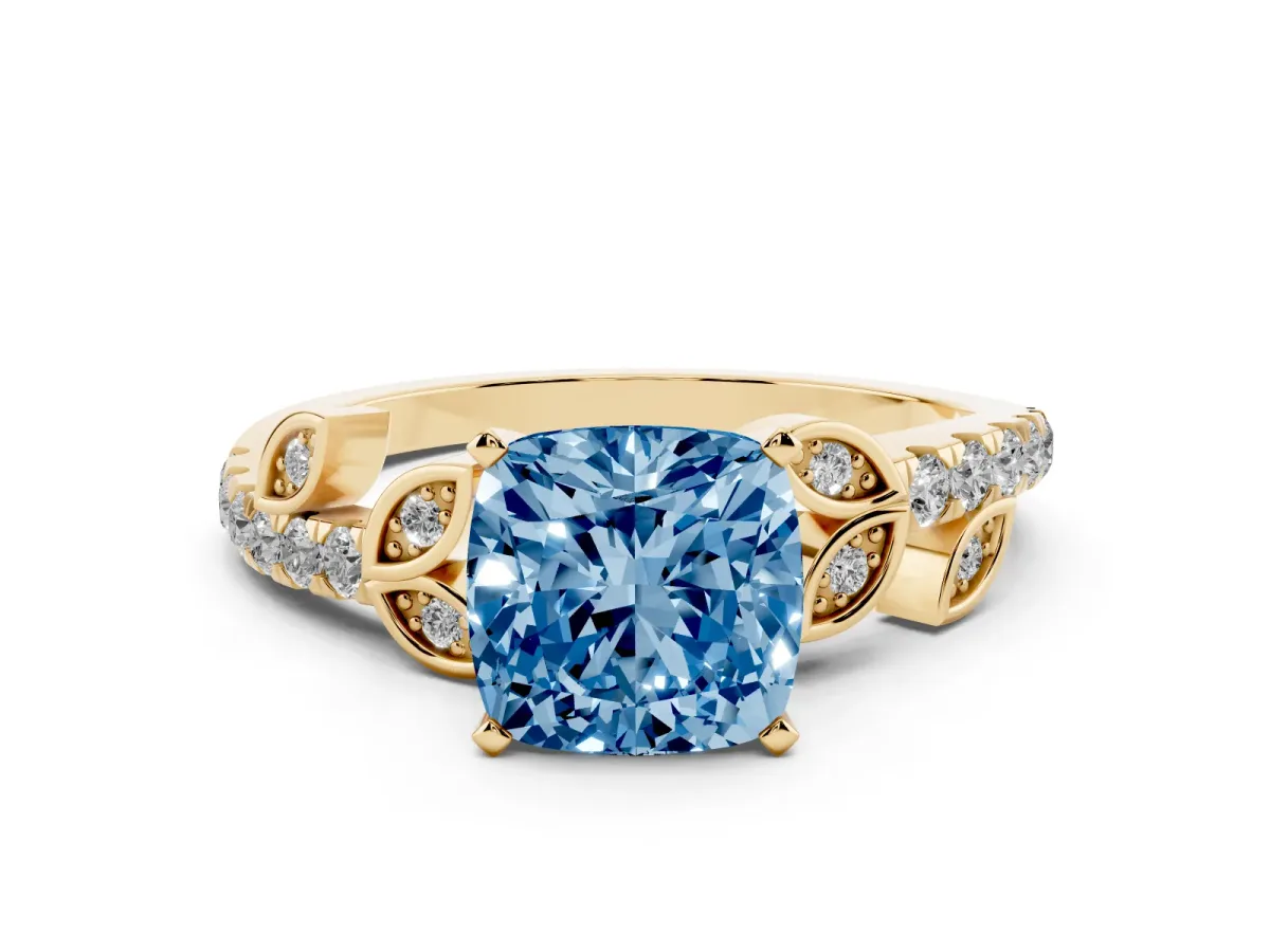 Fancy Blue Cushion Cut Solitaire Leaf-Inspired Diamond Ring with Pavé Band and Four-Prong Setting Yellow gold