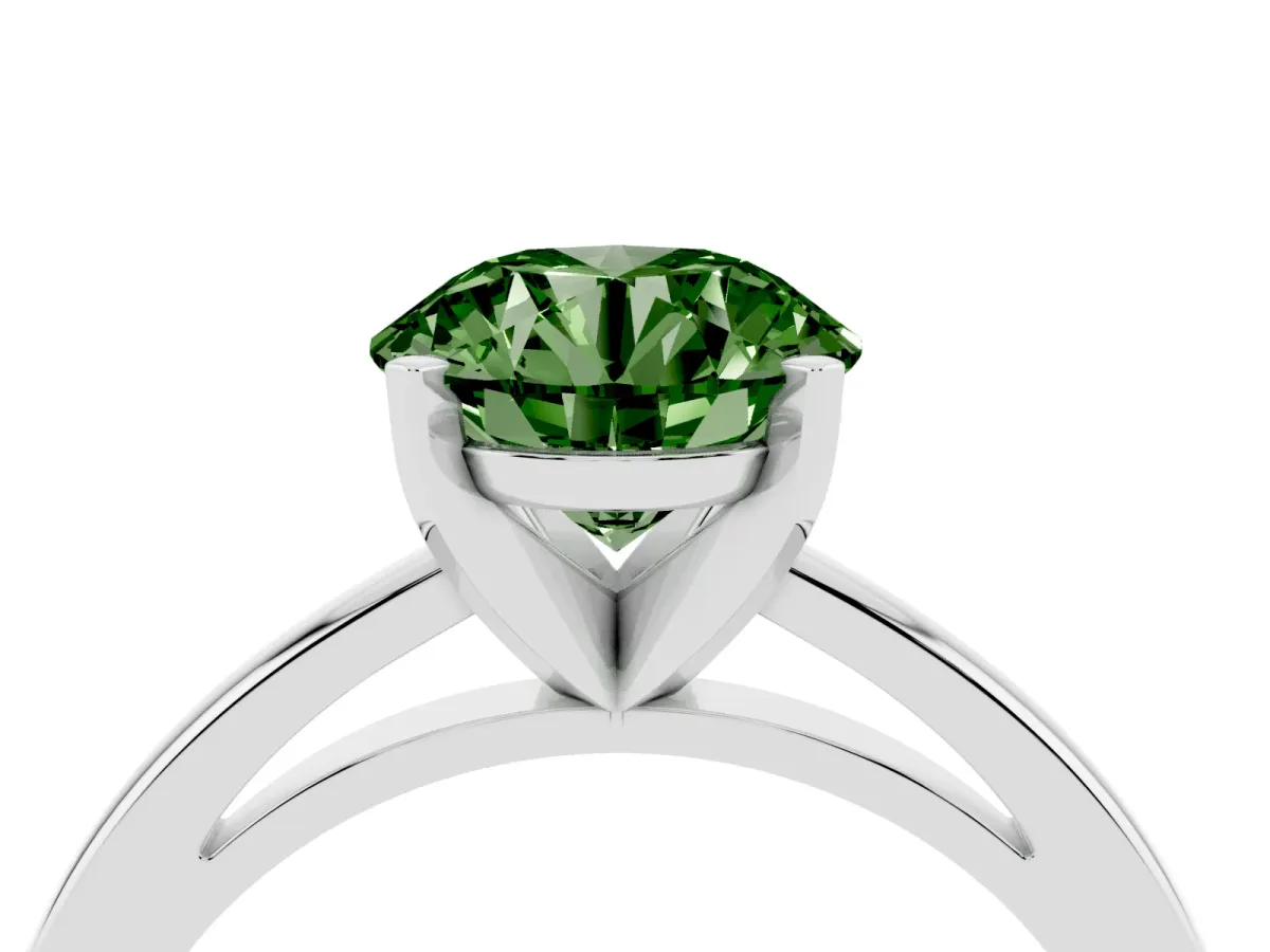 Fancy Green Round Cut Solitaire Diamond Engagement Ring with Four-Prong Setting on a Classic Band Silver