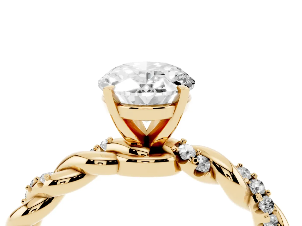 Oval Cut Diamond Solitaire Ring with Twisted Band and Pavé Accents Yellow gold