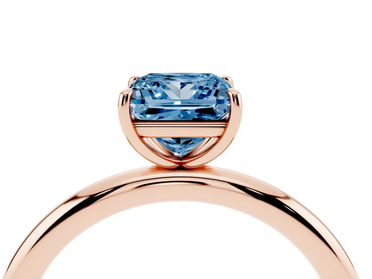 Fancy Blue Princess Cut Solitaire Diamond Ring with Four-Prong Setting on a Plain Band Rose gold