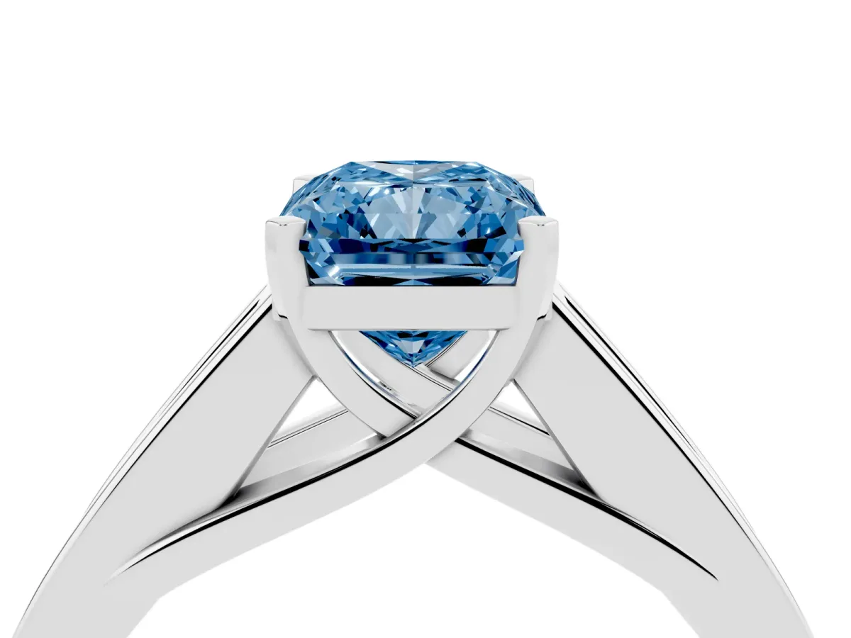 Fancy Blue Radiant Cut Cut Channel Set Solitaire Ring with Four-Prong Setting Silver