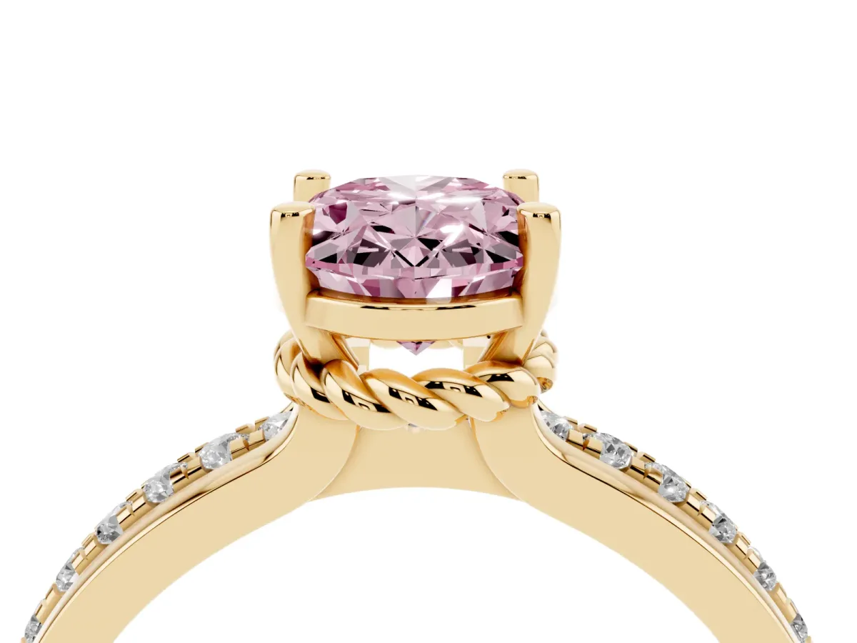 Fancy Pink Oval Cut Solitaire Diamond Ring with Channel Set Band and Six-Prong Setting Yellow gold