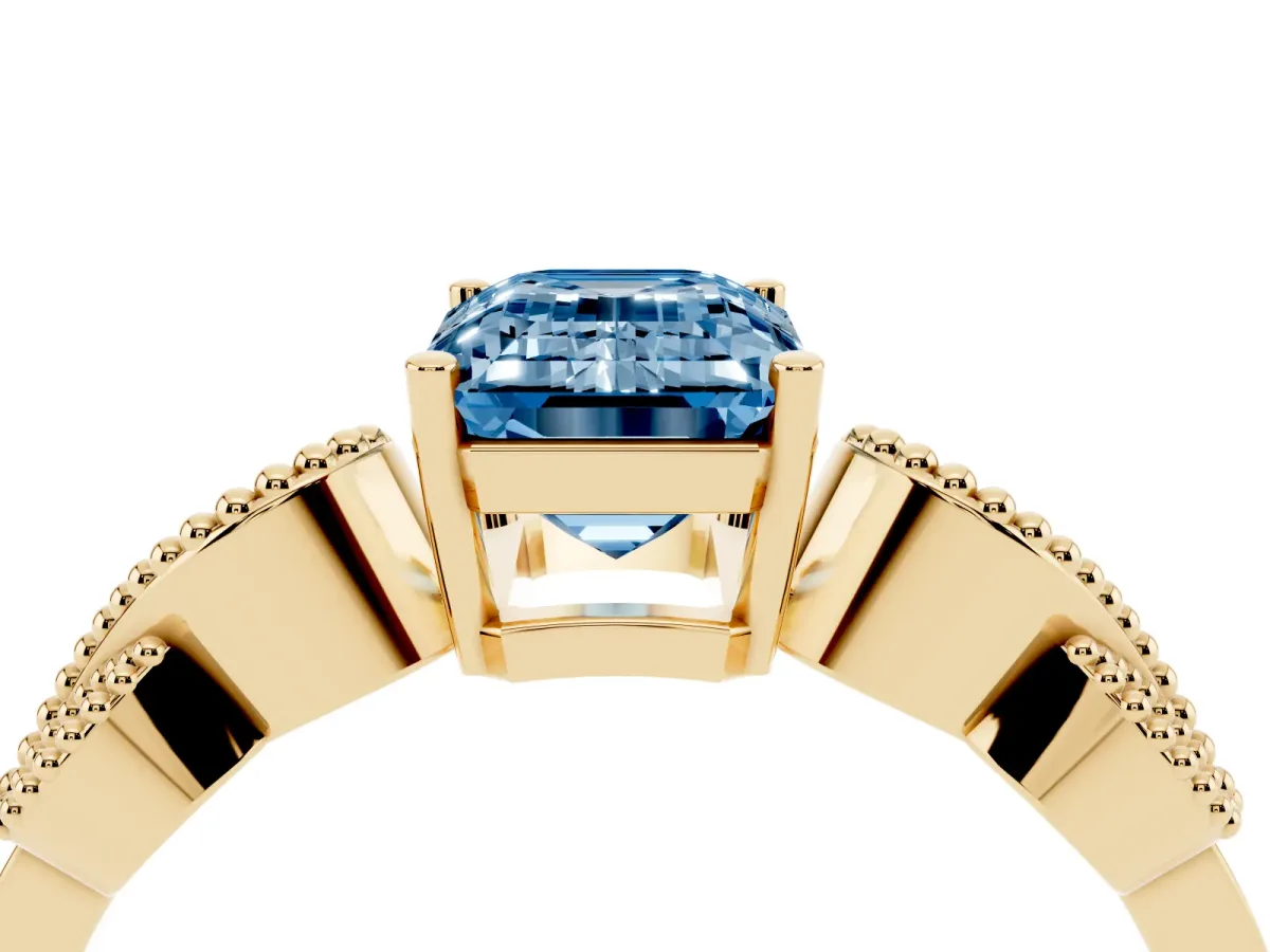 Fancy Blue Emerald Cut Solitaire Milgrain Leaf Band with Prong Setting Yellow gold