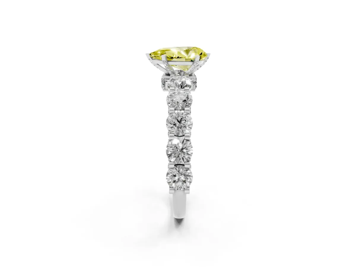 Fancy Yellow Pear Cut Diamond Side Stone Engagement Ring with Four-Prong Setting White gold