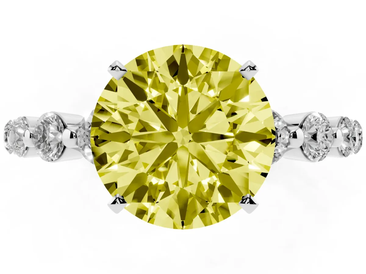 Fancy Yellow Round Cut Solitaire Diamond Ring with Pave Band and Four-Prong Setting Silver