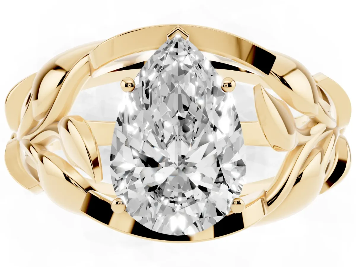 Pear Cut Diamond Leaf-Inspired Engagement Ring with Round Accents and Prong Setting Yellow gold