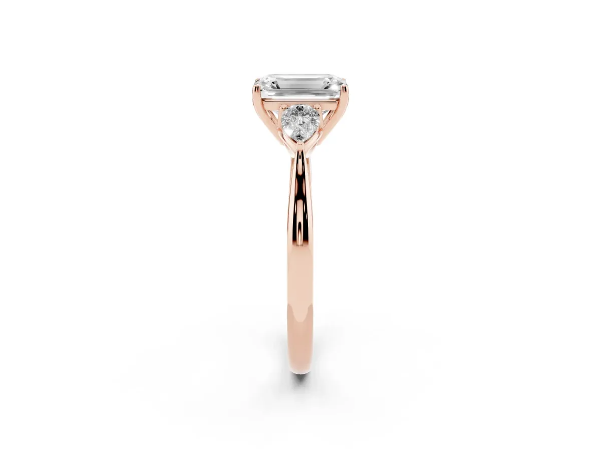 Emerald Cut Diamond Three-Stone Ring with Pear Side Stones and Prong Setting Rose gold