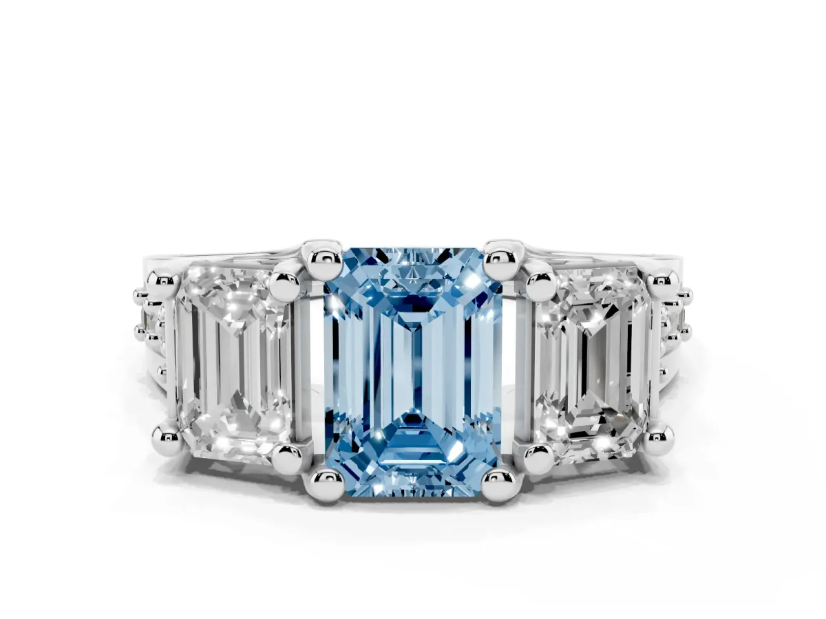 Fancy Blue Emerald Cut Diamond Three-Stone Ring with Channel Set Band and Four-Prong Setting Silver