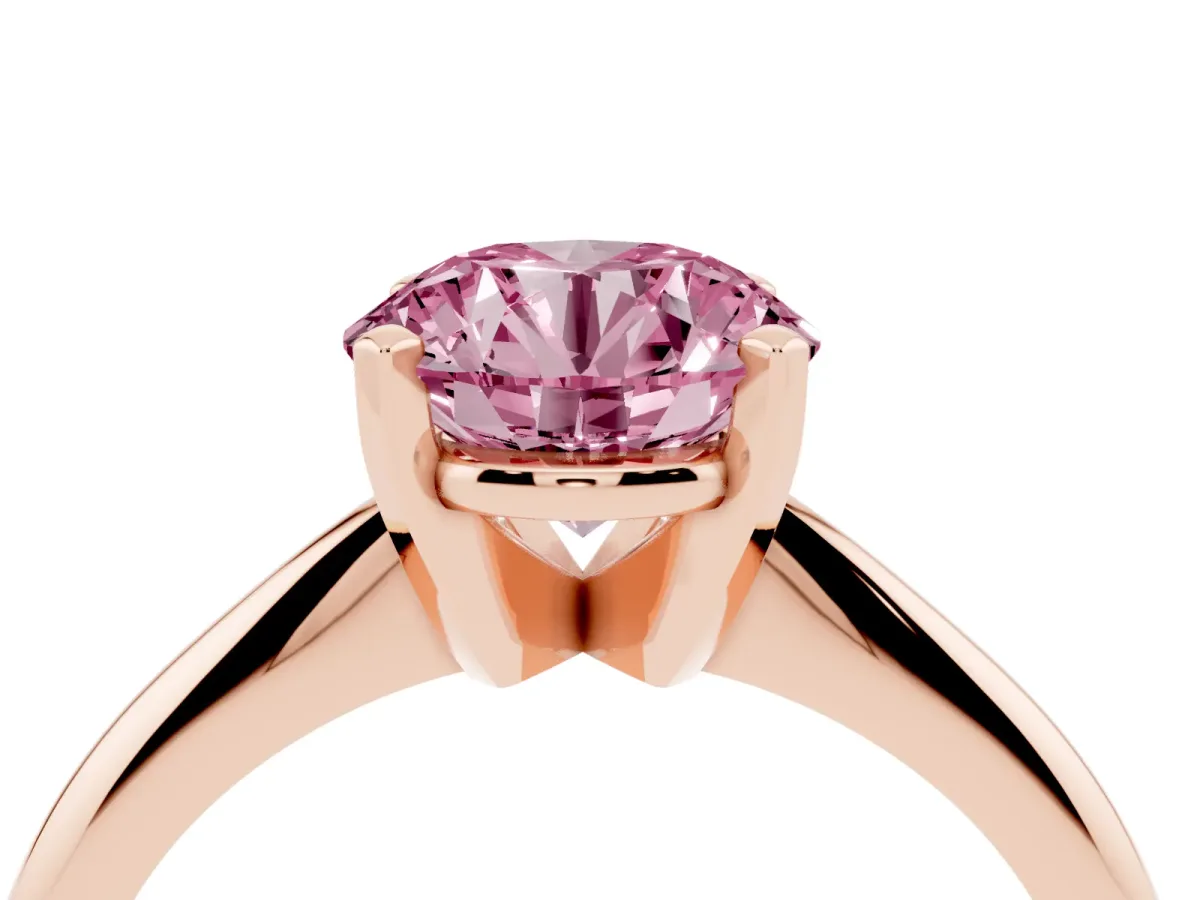 Fancy Pink Round Cut Cut Solitaire Ring with Four-Prong Setting on a Classic Band Rose gold