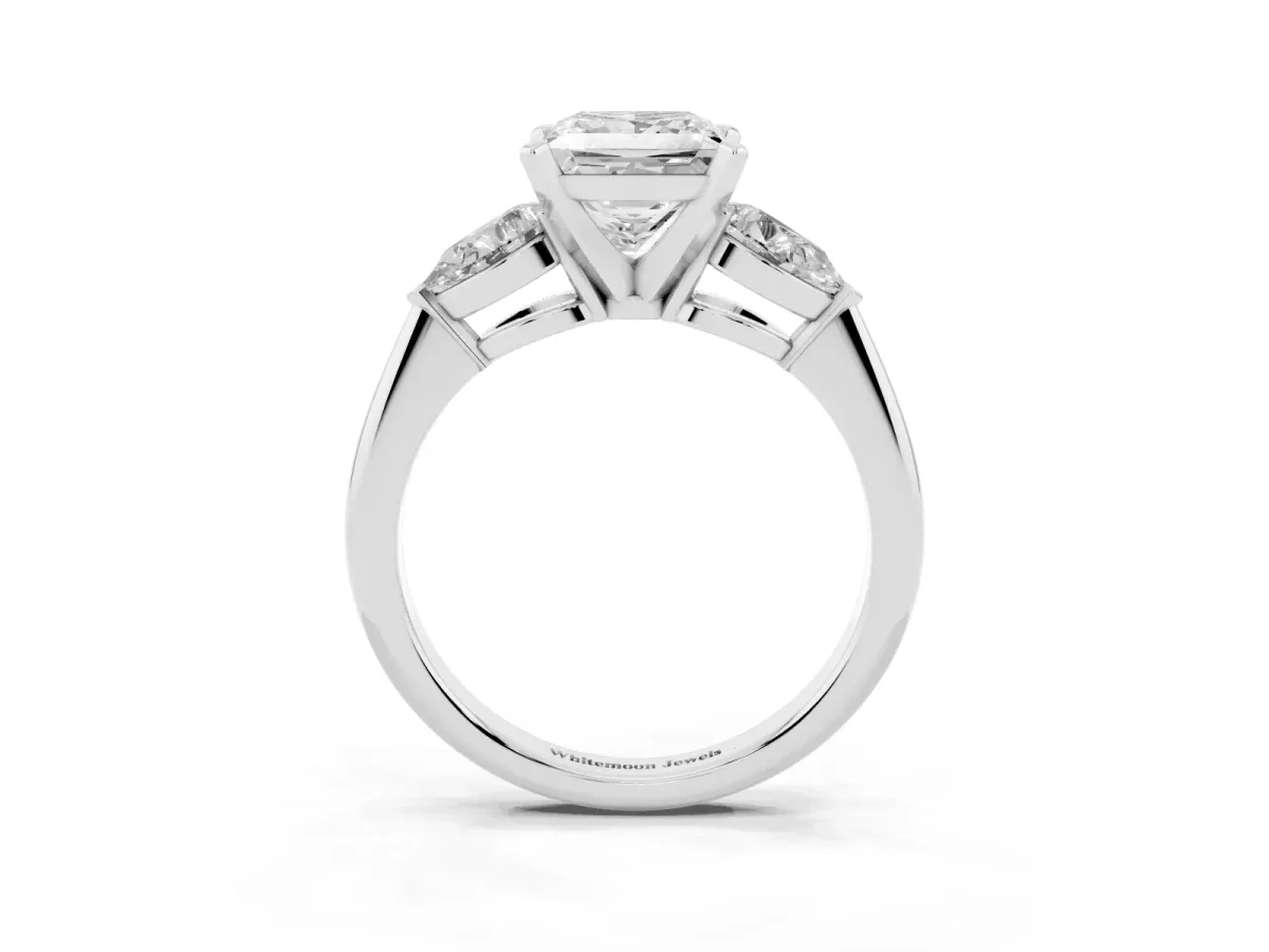 Three-Stone Princess Cut Diamond Ring with Pear Side Stones and Four-Prong Setting Platinum