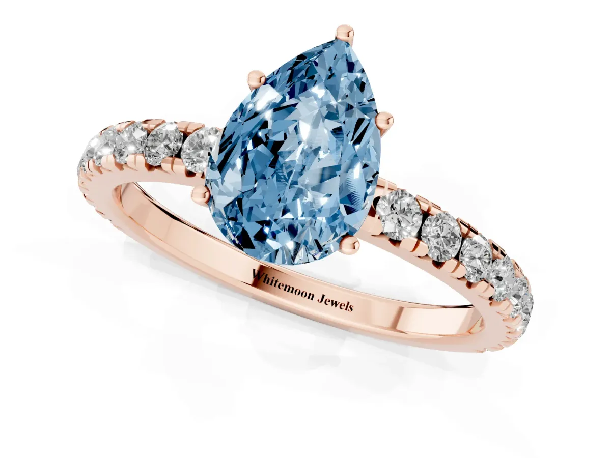 Fancy Blue Pear Cut Diamond Pavé Solitaire Engagement Ring with Four-Prong Setting Rose gold