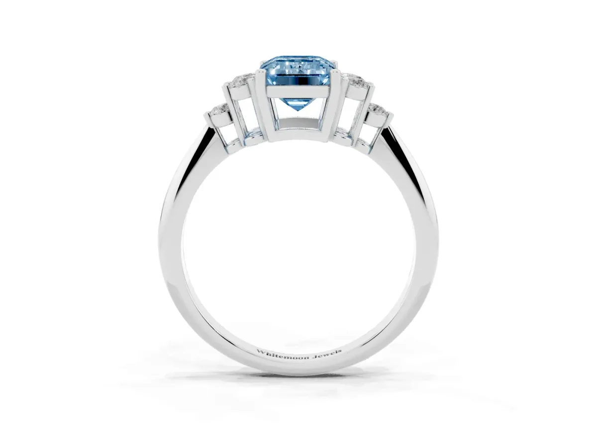 Fancy Blue Emerald Cut Cut Diamond Cluster Ring with Solitaire Band and Four-Prong Setting Platinum
