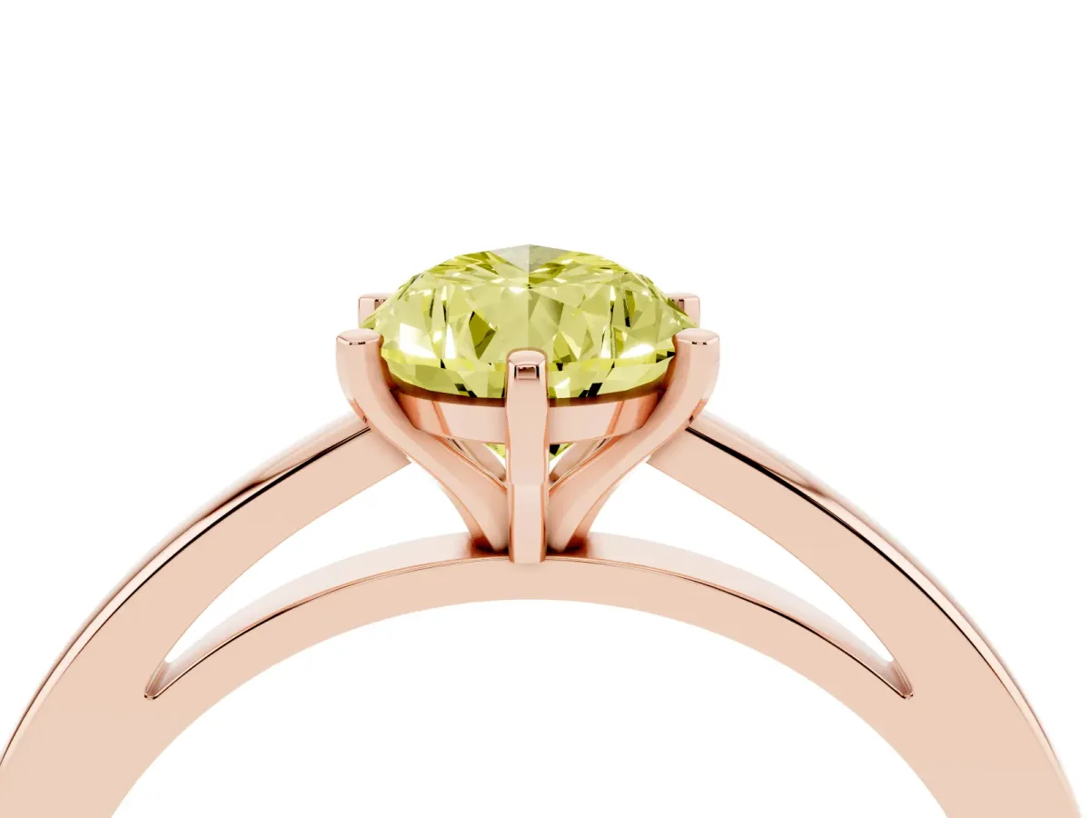 Fancy Yellow Pear Cut Solitaire Diamond Engagement Ring with Four-Prong Setting on a Classic Band Rose gold