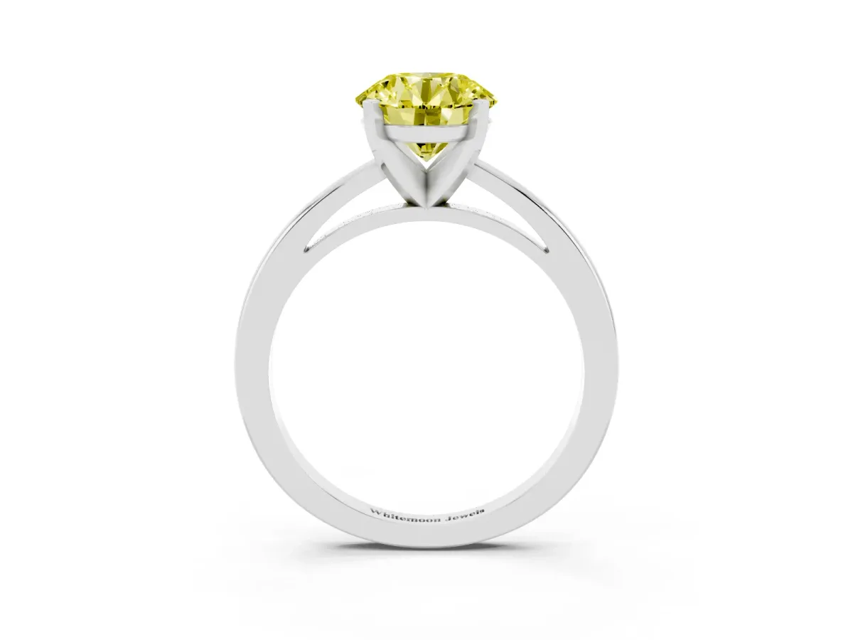 Fancy Yellow Round Cut Solitaire Diamond Engagement Ring with Four-Prong Setting on a Classic Band Platinum