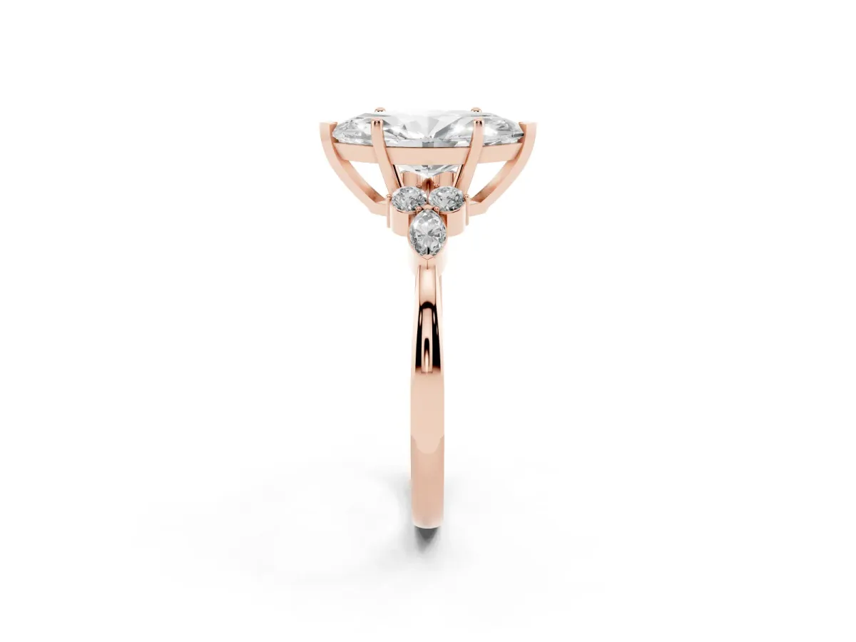 Marquise Cut Brilliant Diamond Solitaire Ring with Pear Side Stones and Four-Prong Setting Rose gold
