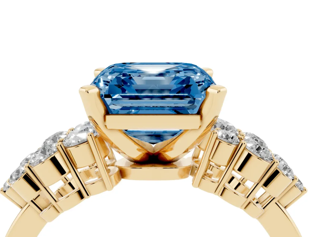 Fancy Blue Asscher Cut Cluster Diamond Engagement Ring with Pavé Band and Four-Prong Setting Yellow gold